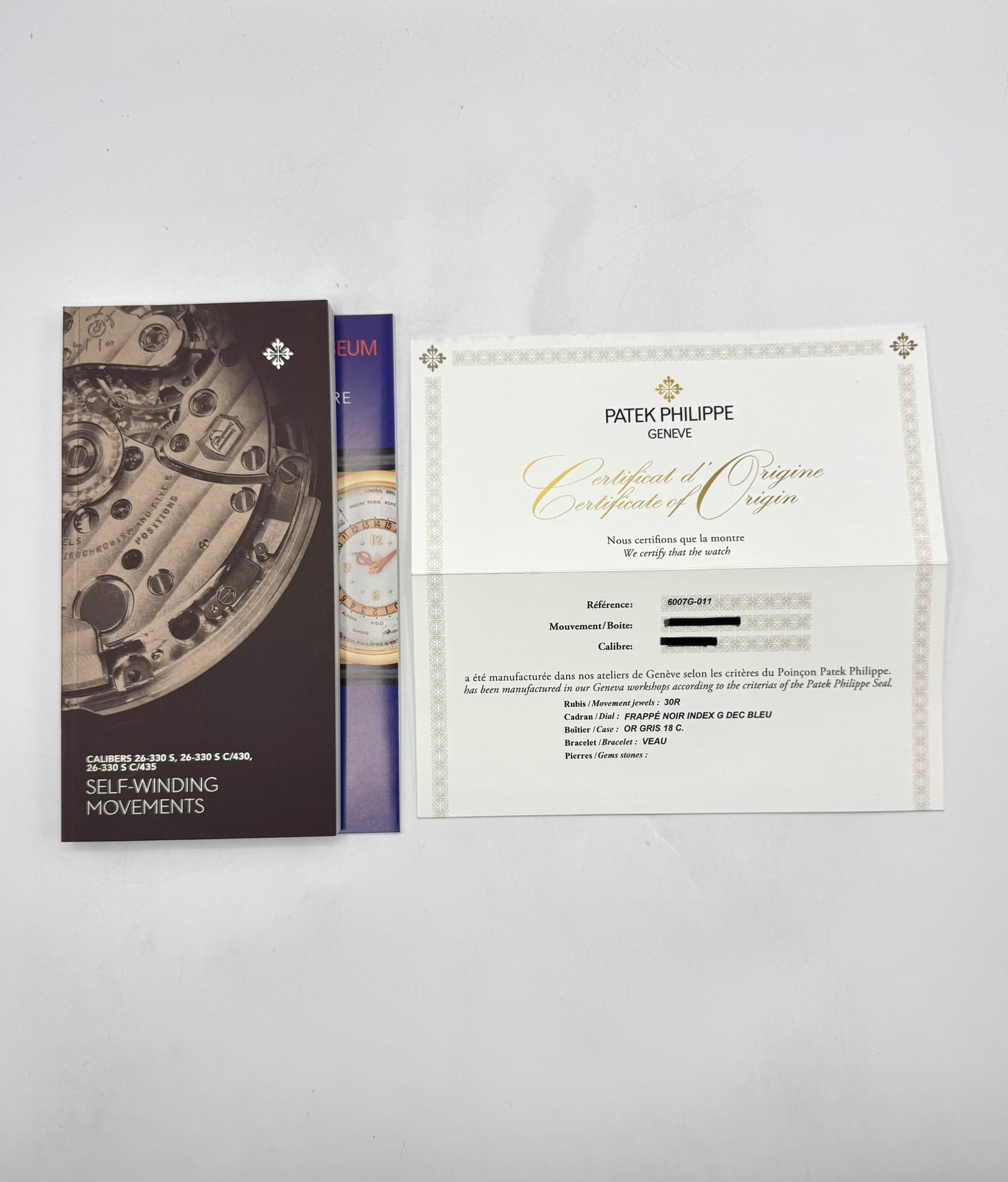 2025 Patek Philippe Calatrava Blue 6007G White Gold Black Dial - MyWatchLLC