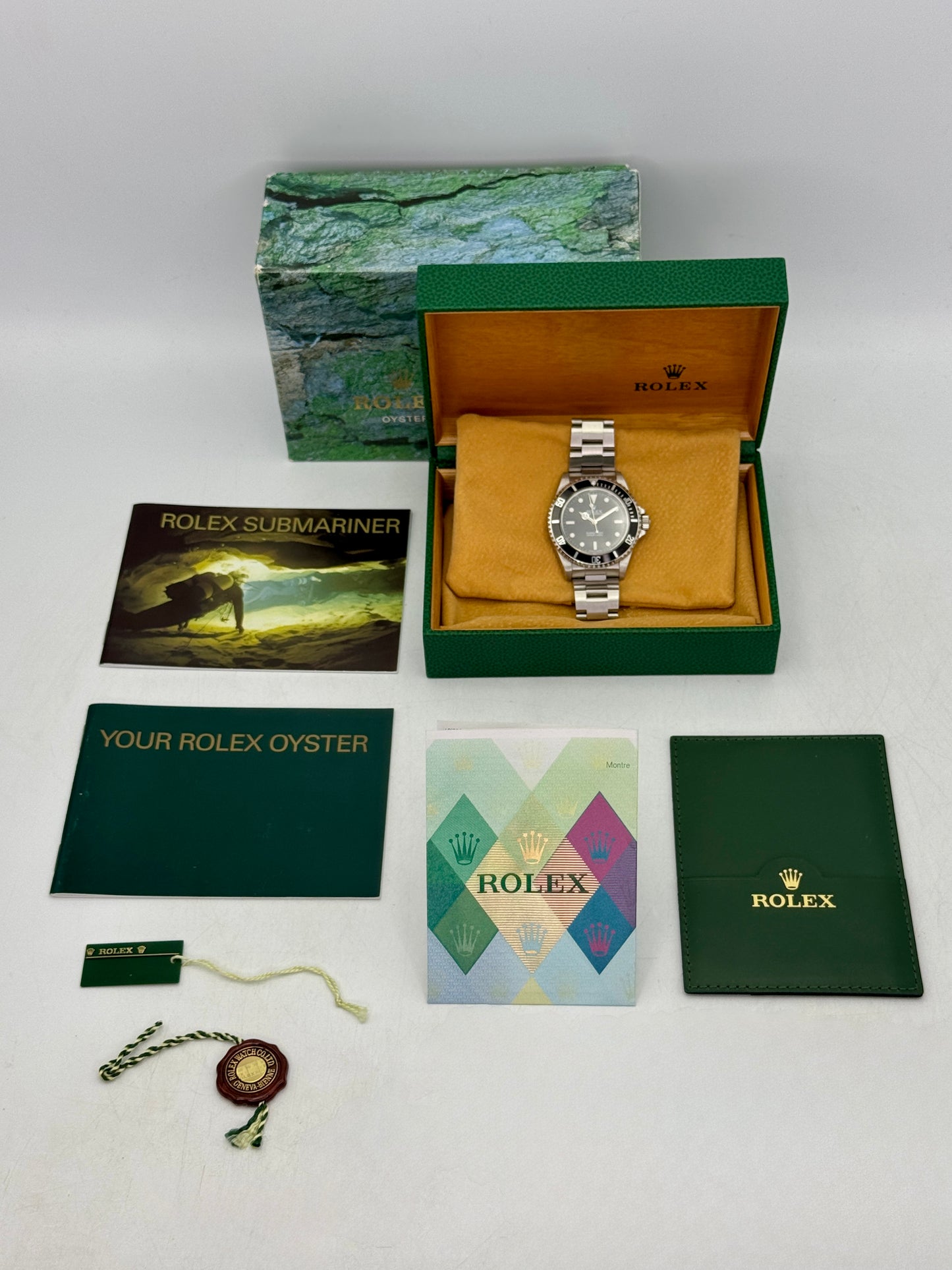 2006 Rolex Submariner 40mm 14060M Stainless Steel Two-Liner Black Dial (Collectors Set)