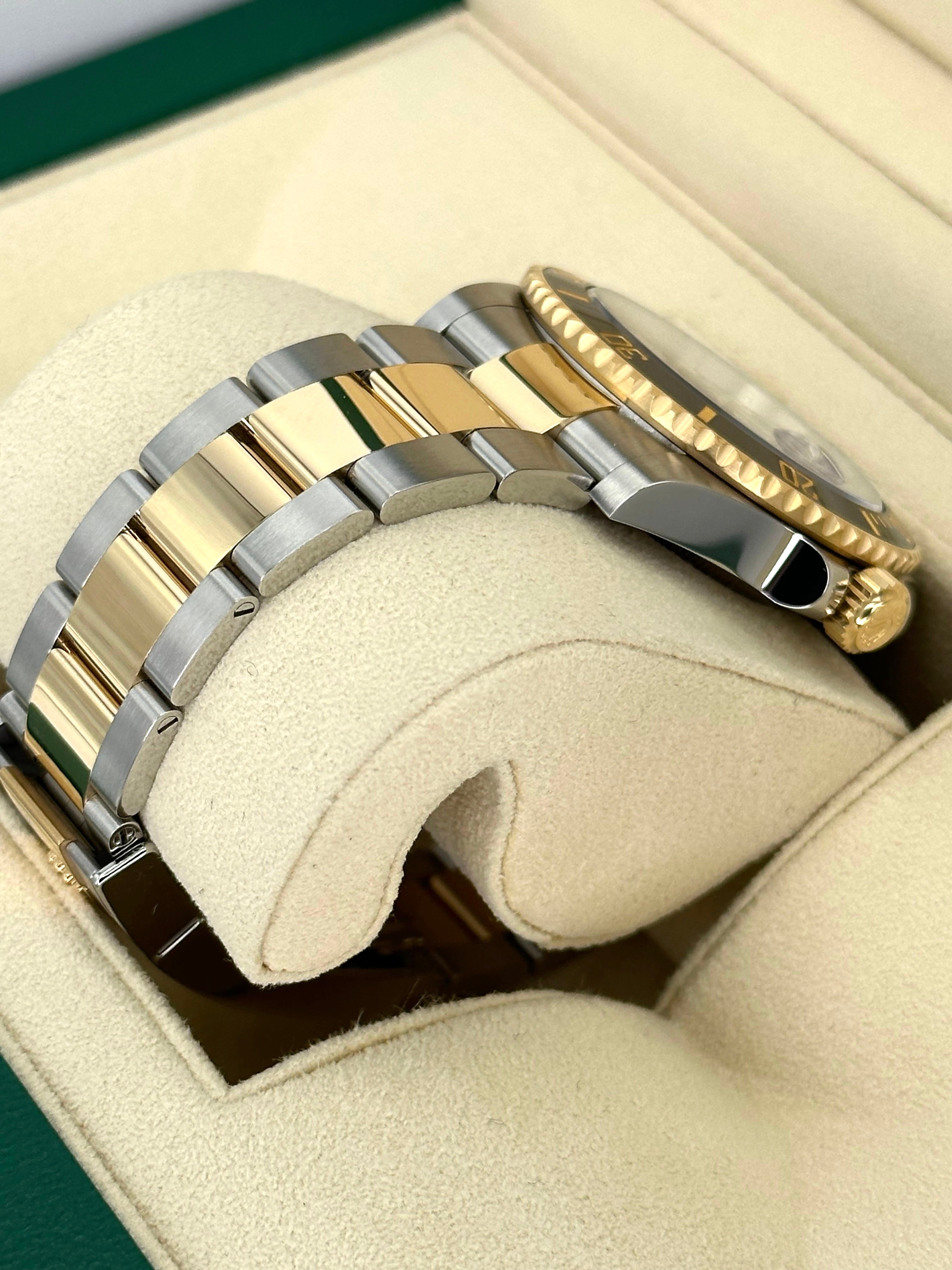 Rolex submariner two outlet tone bracelet