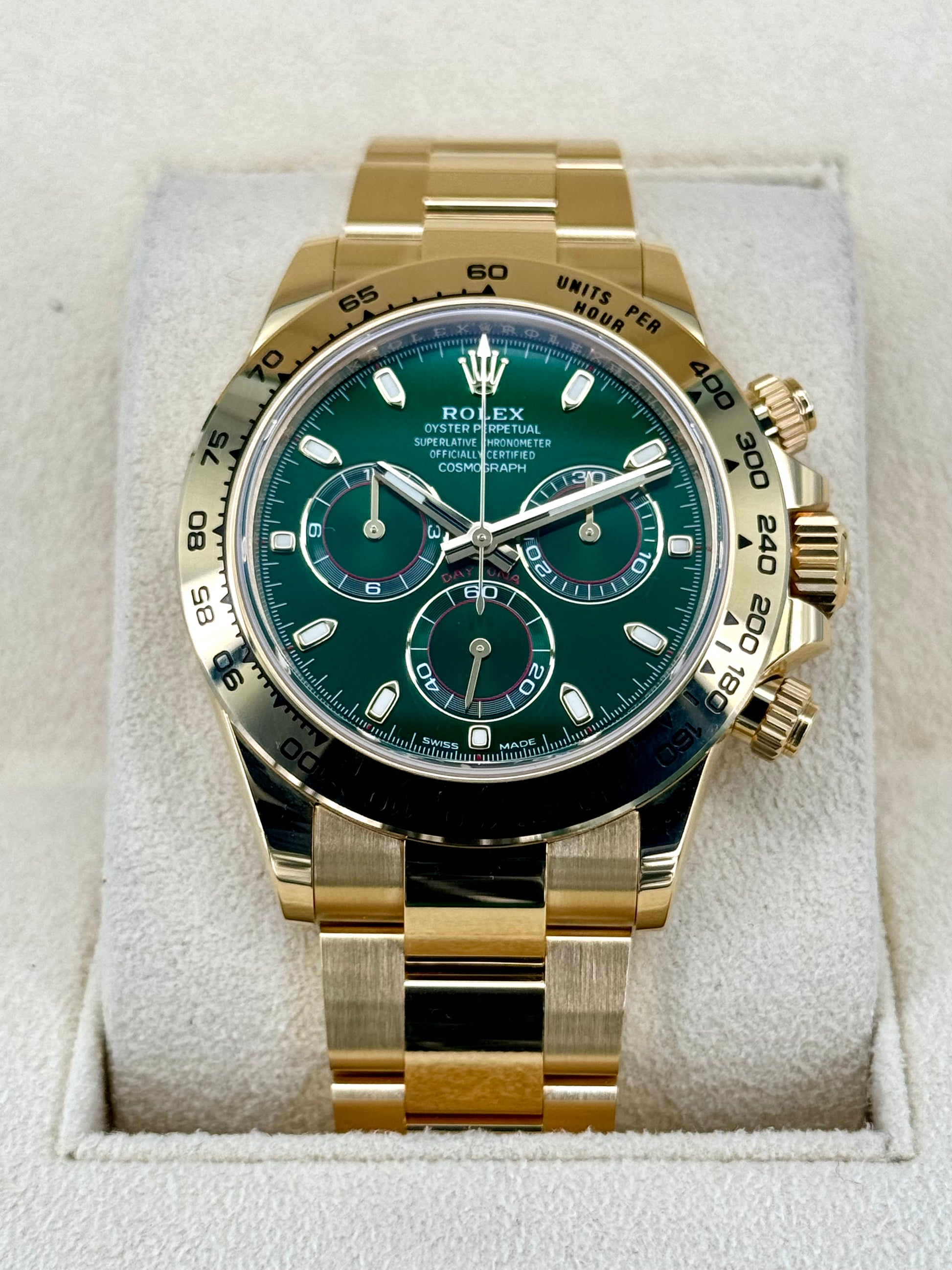 Rolex yellow gold top daytona green dial