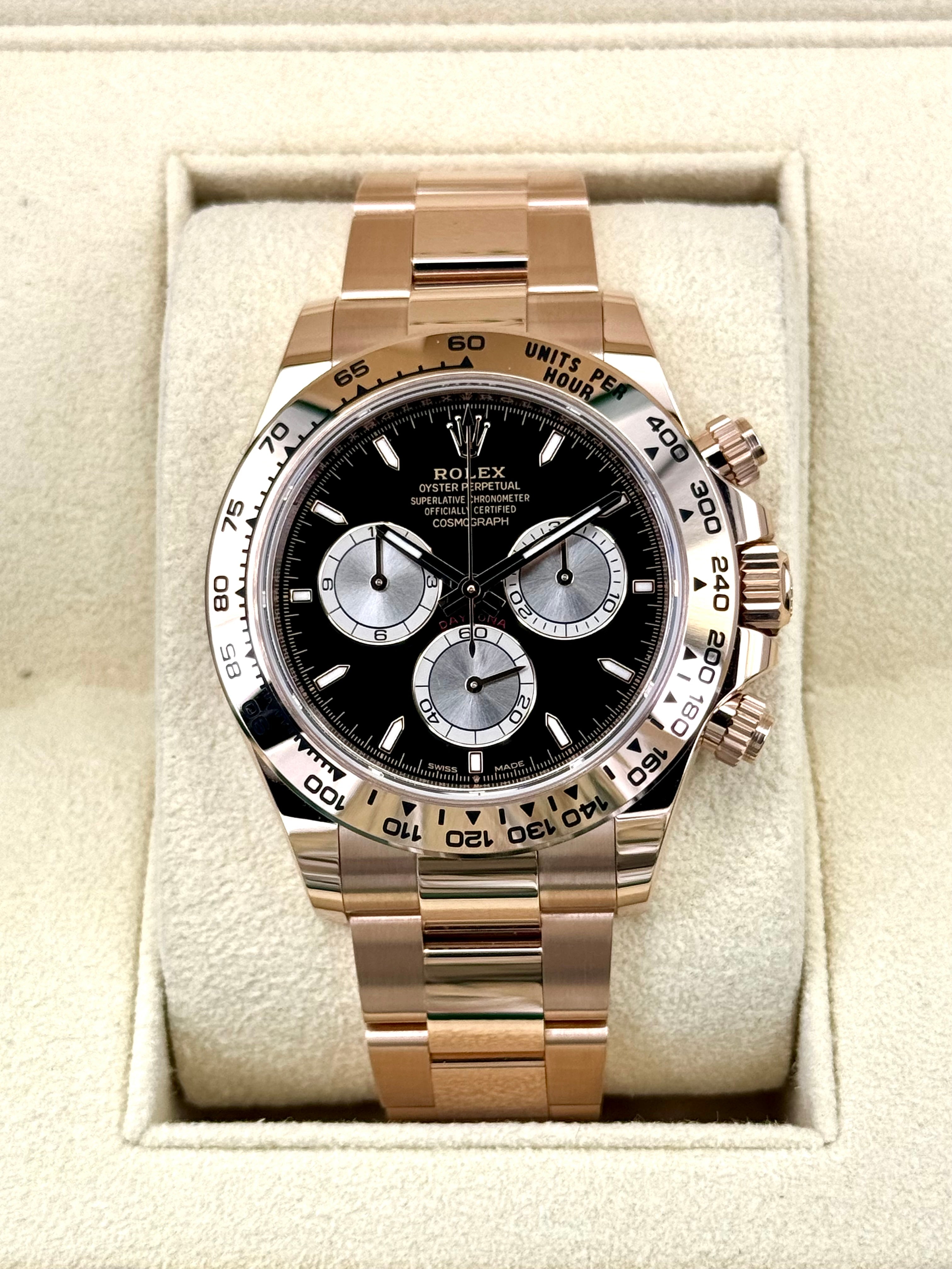 Rolex daytona black rose on sale gold