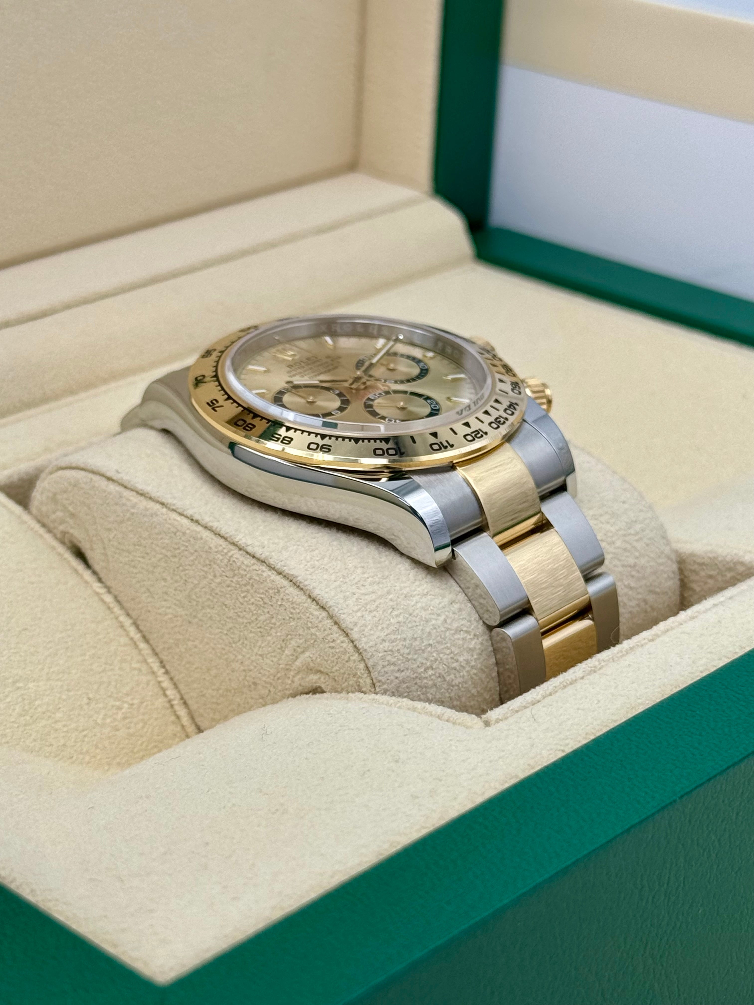 Rolex daytona outlet champagne dial