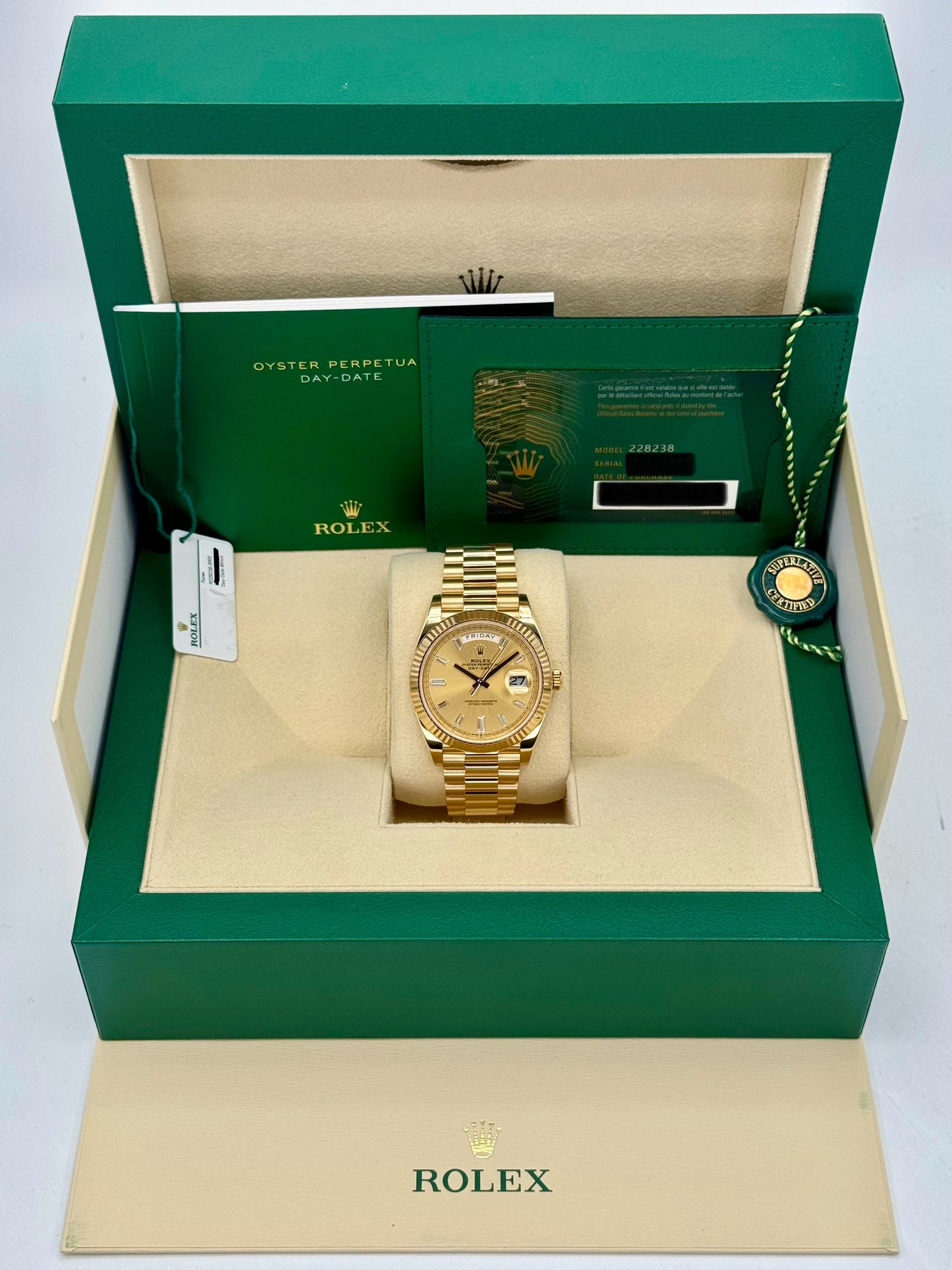 2023 Rolex Day-Date 40mm 228238 Champagne Diamond Baguette Dial