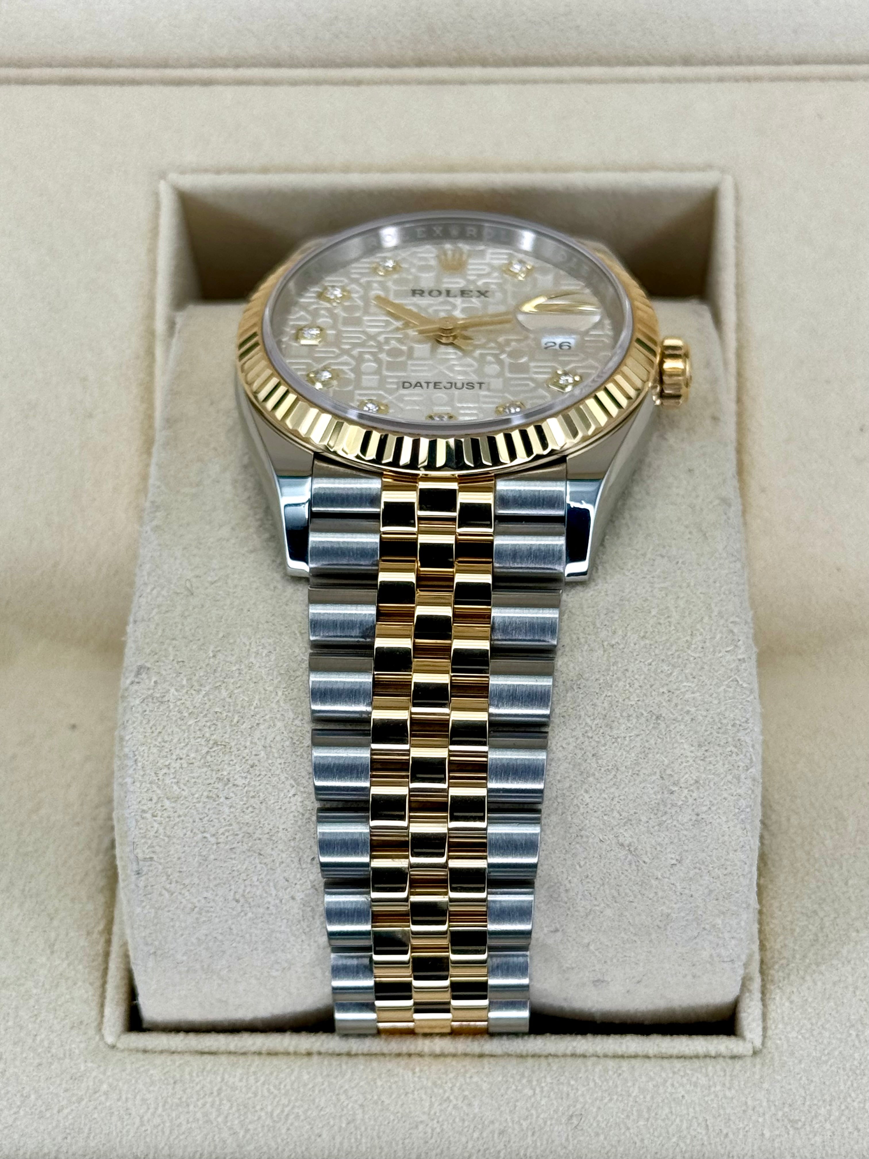 Rolex datejust anniversary dial hot sale